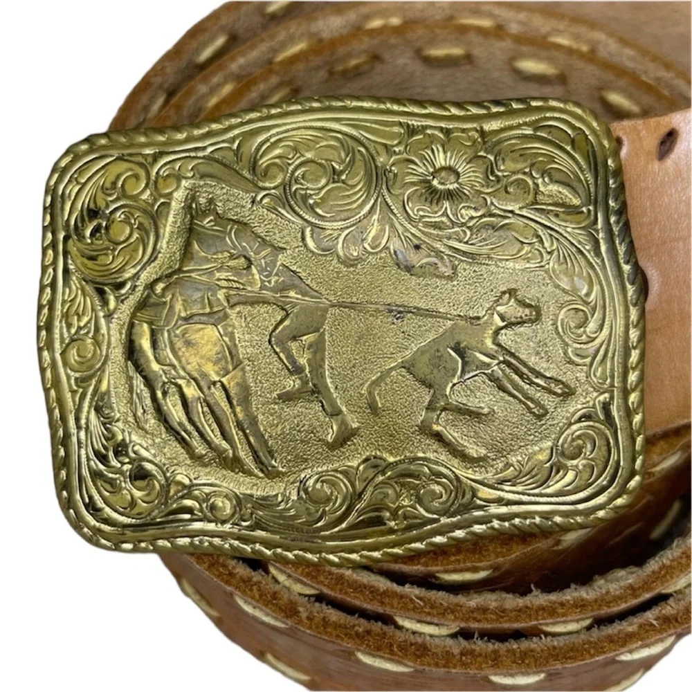 Cowboy belt buckle and leather belt